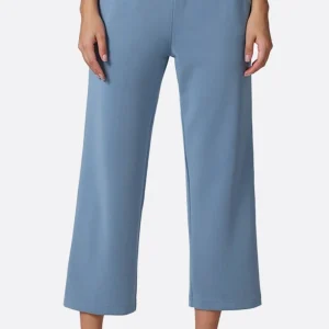 Pantalon large bleu en tissu technique à coupe 7/8
